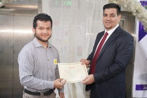 Dean of College of Islamic Sciences and His Assistants Honor the Winners of (Bismill Quranic Competition)